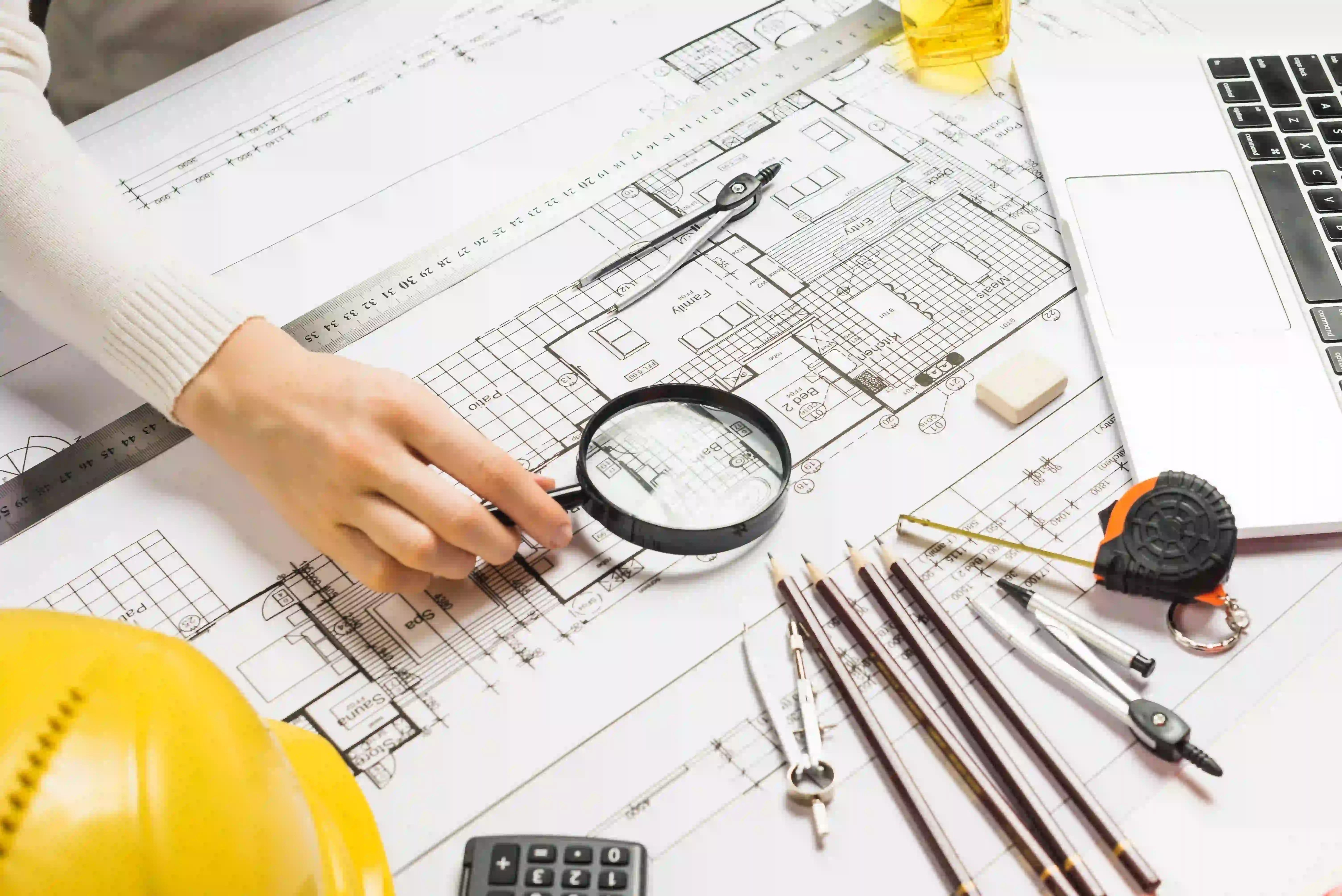 Quantity Surveying in Qatar using construction blueprints for BOQ preparation and accurate project cost estimation.